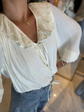Ivory Ruffles VNeck Blouse